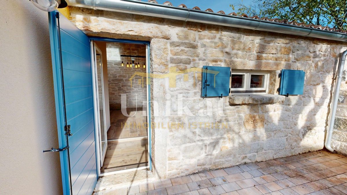 Dvojna hiša z garažo in velikim vrtom